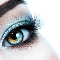 Woman's eye with blue eye makeup
